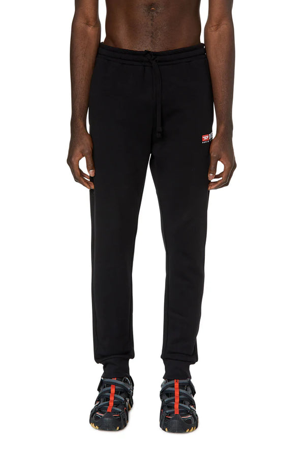 Track pants with embroidered logo