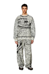 Track pants with cracked coating